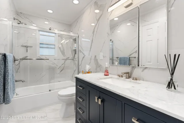 a view of a chairs and a table in the patio