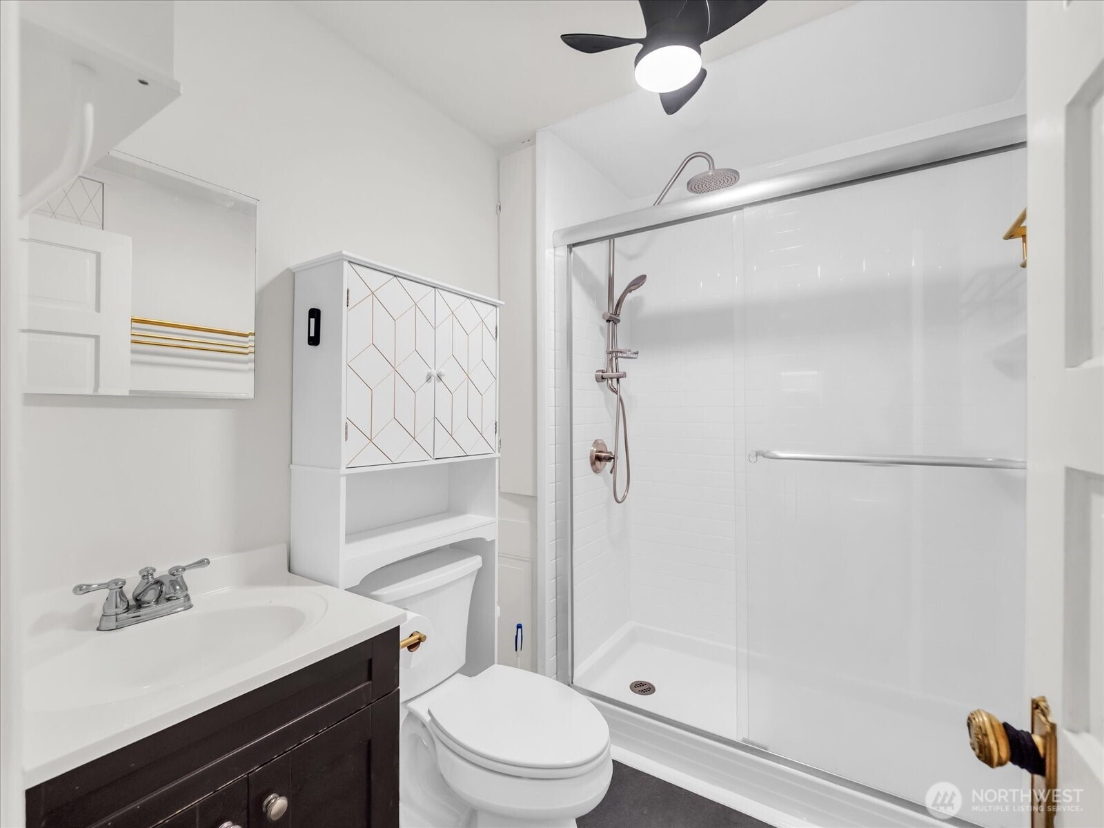 7 Harrison Street, Unit 17 Seattle, WA 98109 - Photo 12 of 20 a bathroom with a sink a toilet and shower