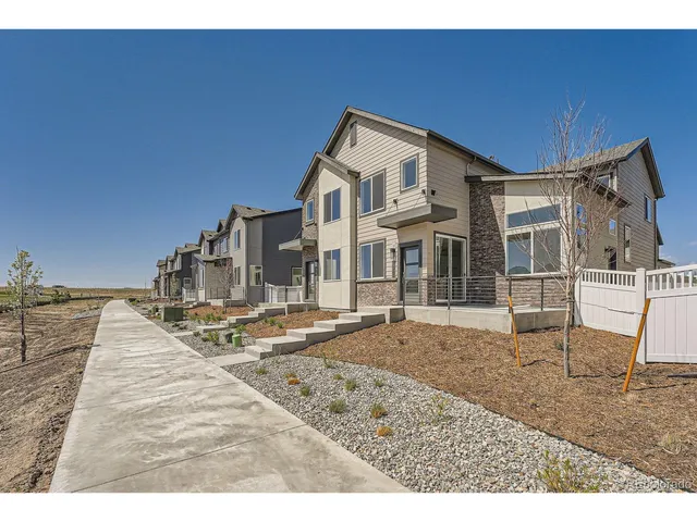 a view of a house with wooden floor and a tub