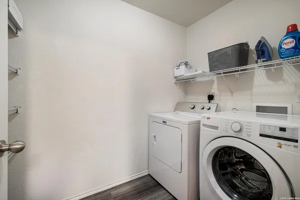 a utility room with dryer and washer