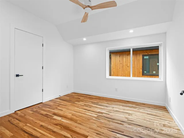 a view of a room that has a window