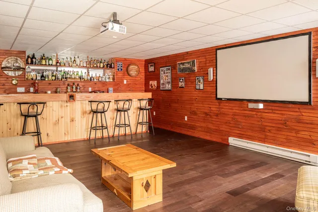 a room with lots of wooden cabinets