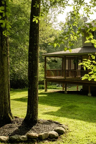 a view of a swimming pool with an outdoor seating
