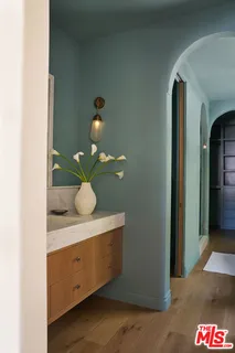 a vase of flowers sitting on a table