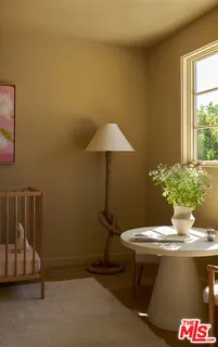a vase of flowers sitting on a table