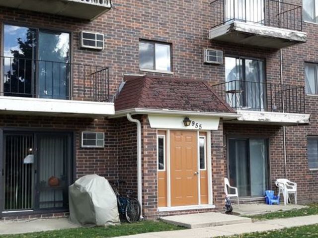 955 North Rohlwing Road, Unit 101A Addison, IL 60101 - Photo 1 of 13 a front view of a house
