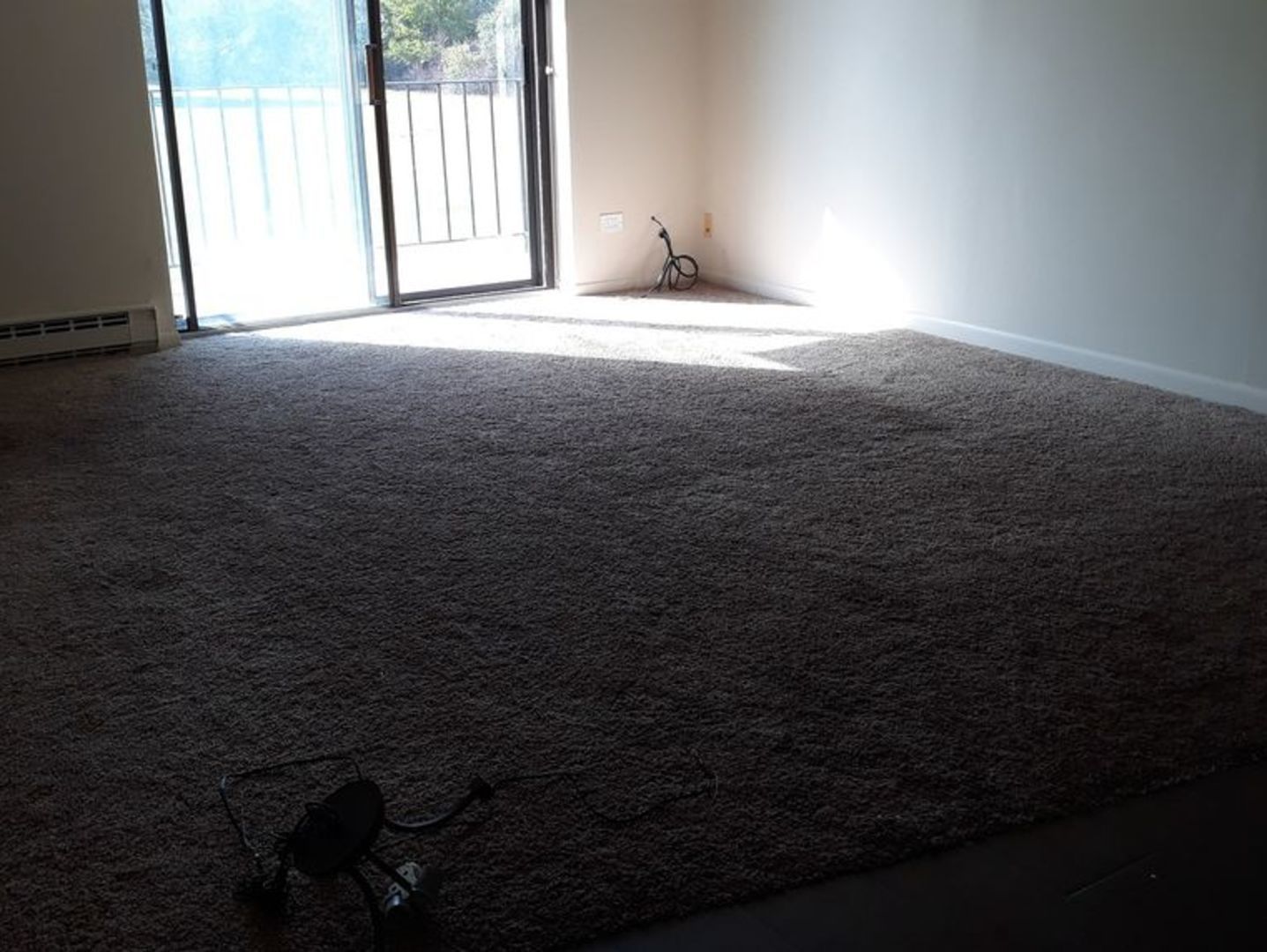955 North Rohlwing Road, Unit 101A Addison, IL 60101 - Photo 8 of 13 a view of an empty room with a window