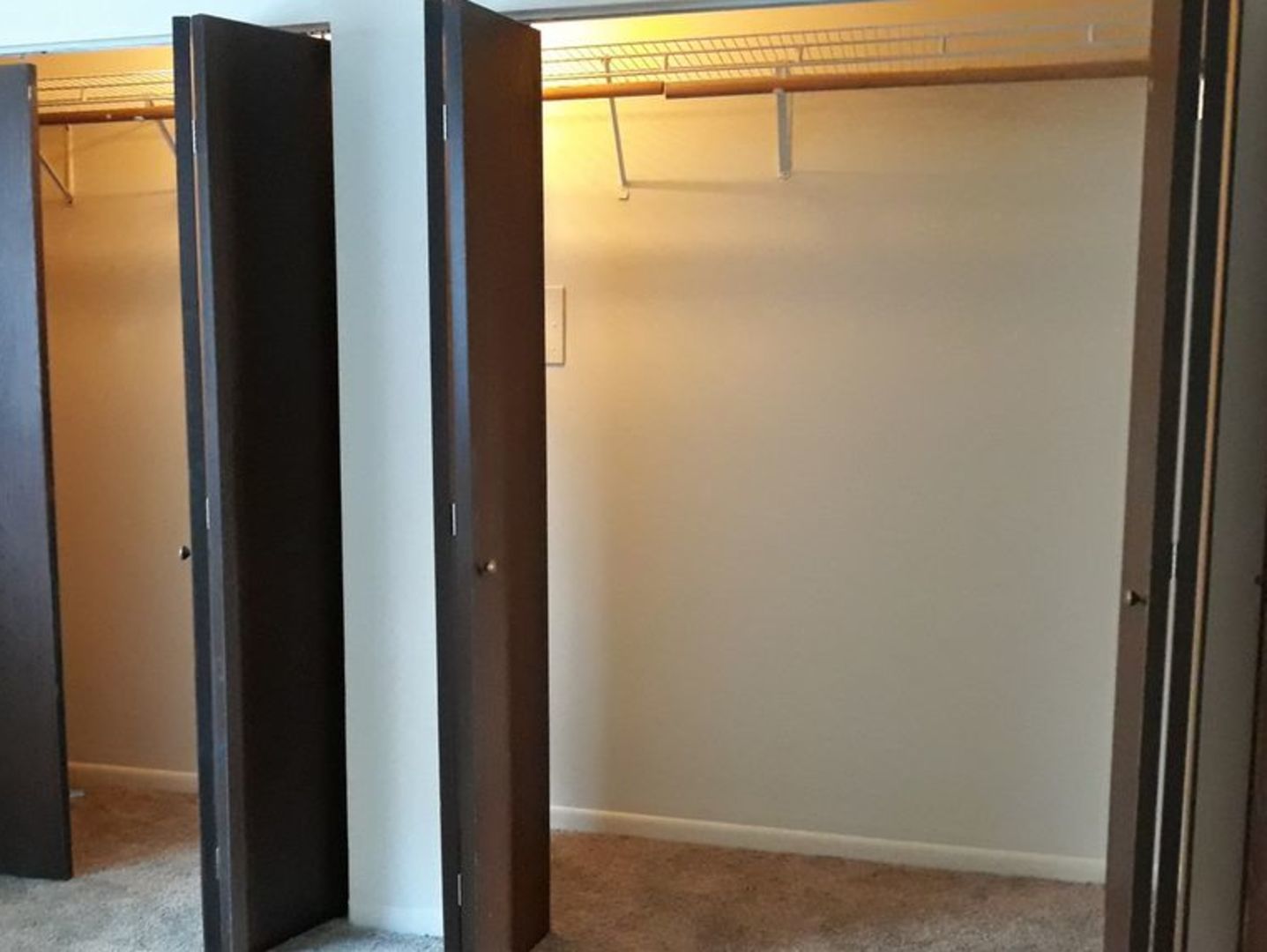 955 North Rohlwing Road, Unit 101A Addison, IL 60101 - Photo 9 of 13 a view of a room with a door and a window
