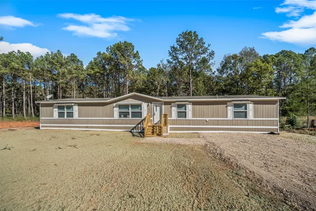 a house view with a outdoor space