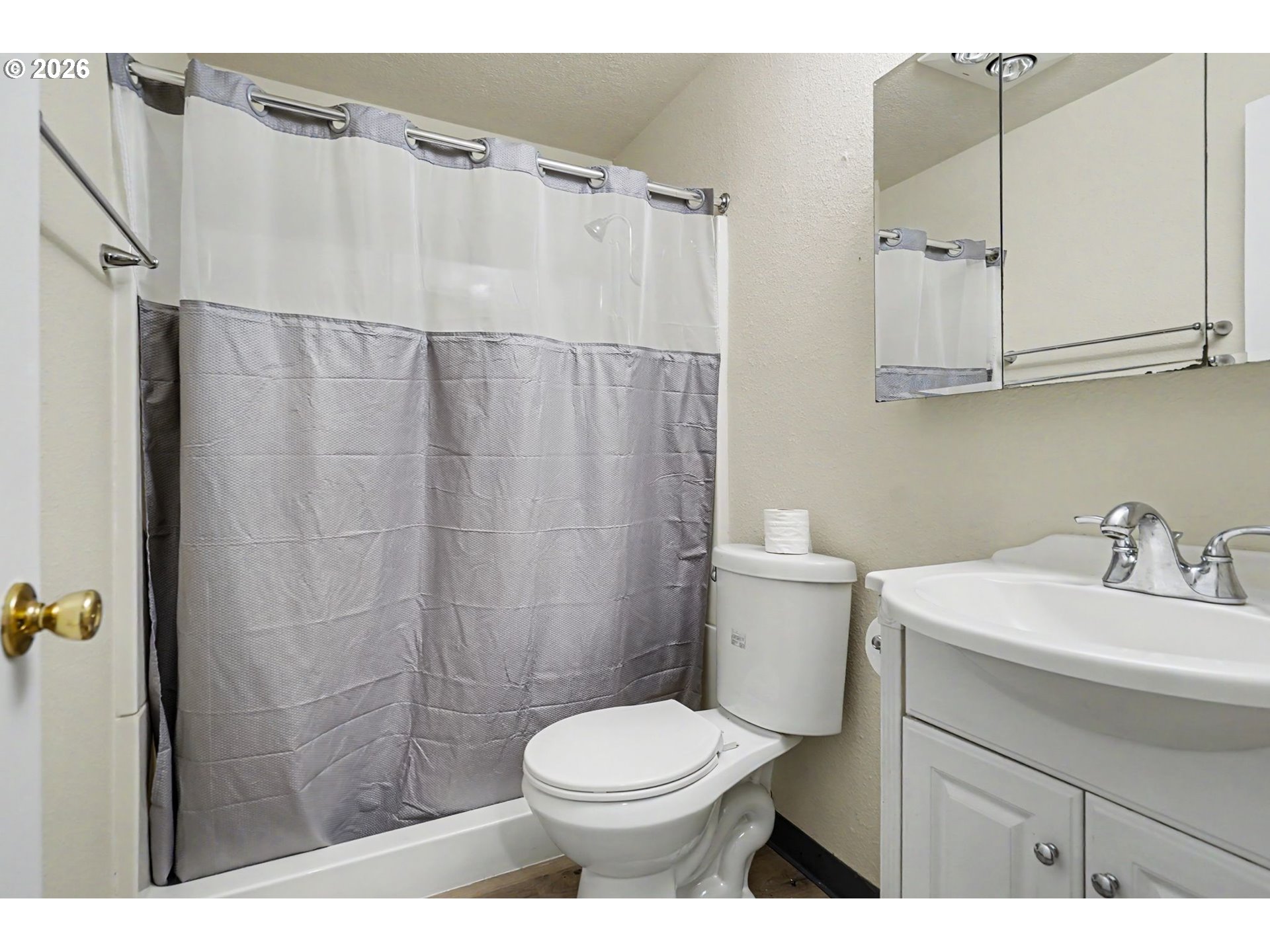 777 Boone Road Southeast, Unit 12 Salem, OR 97302 - Photo 16 of 16 a bathroom with a sink a toilet and shower