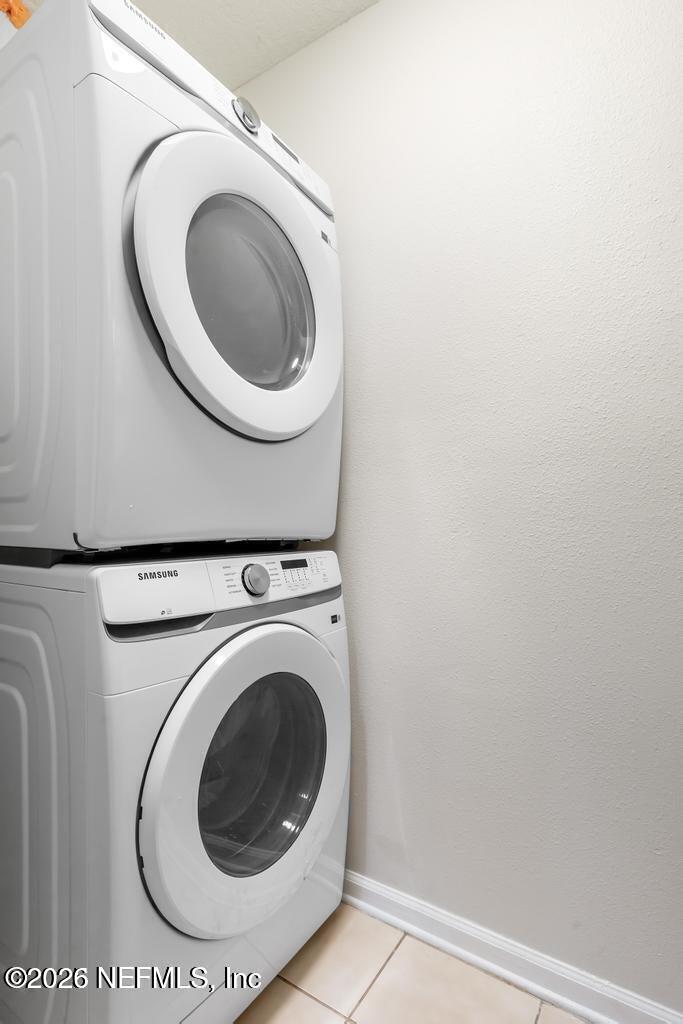7920 Merrill Road, Unit 2004 Jacksonville, FL 32277 - Photo 6 of 13 a utility room with dryer and washer