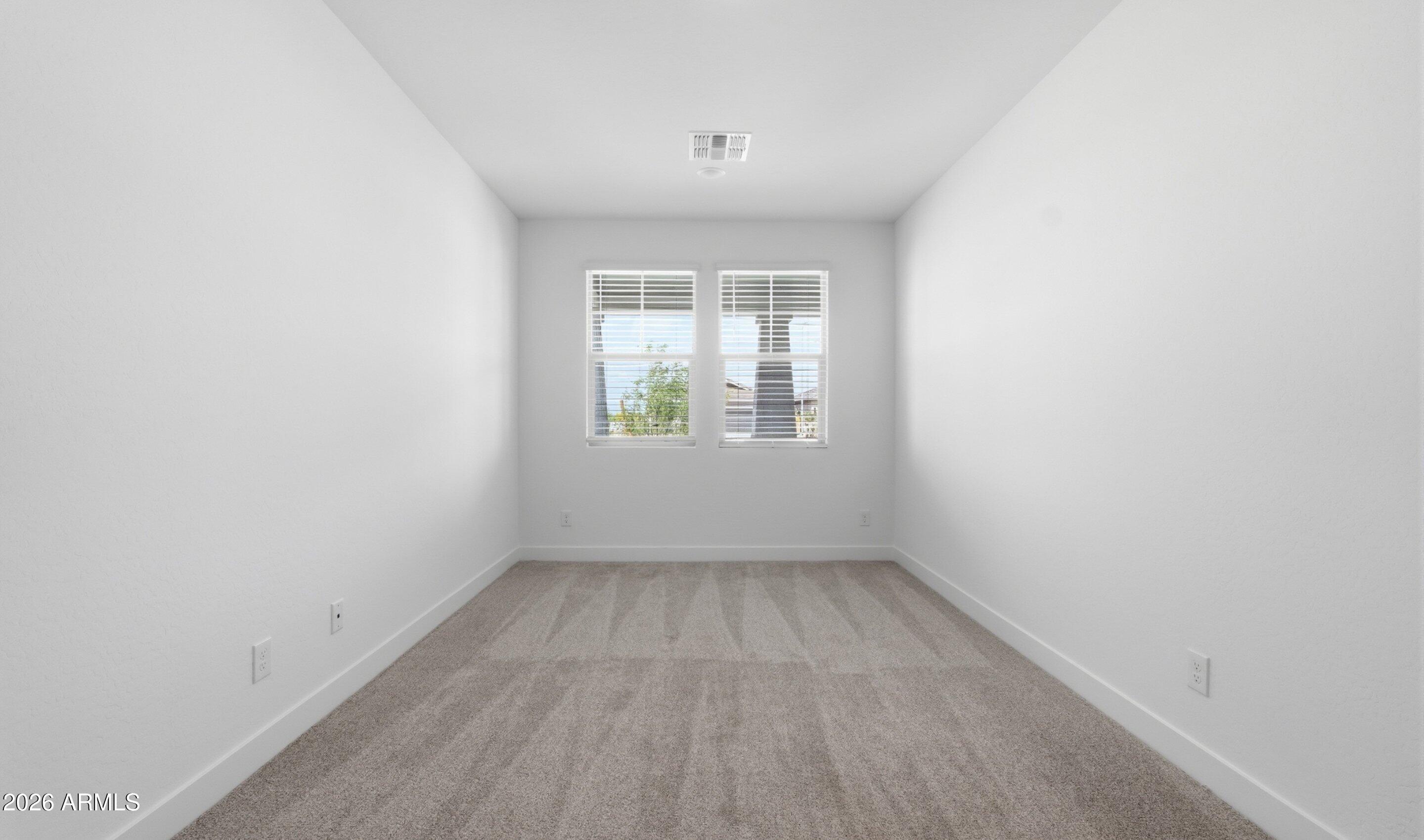 7779 West Sands Road Glendale, AZ 85303 - Photo 19 of 37 an empty room with a window