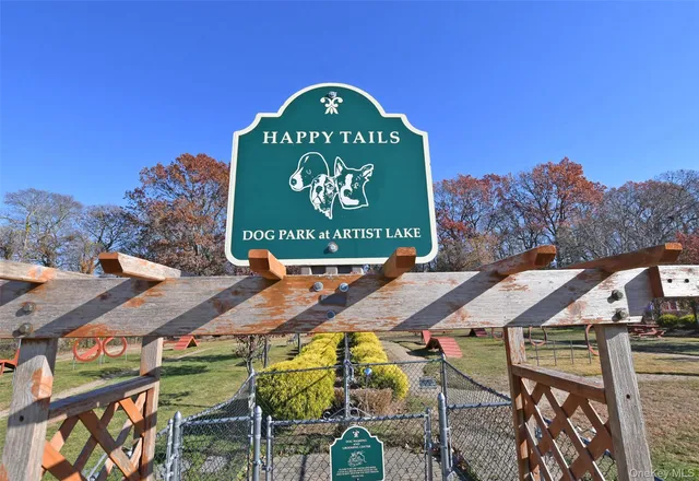 a sign on a pole on a street