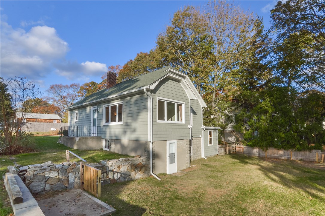 102 Davidson Road Warwick, RI 02886 - Photo 24 of 37 Back yard with door into the basement level