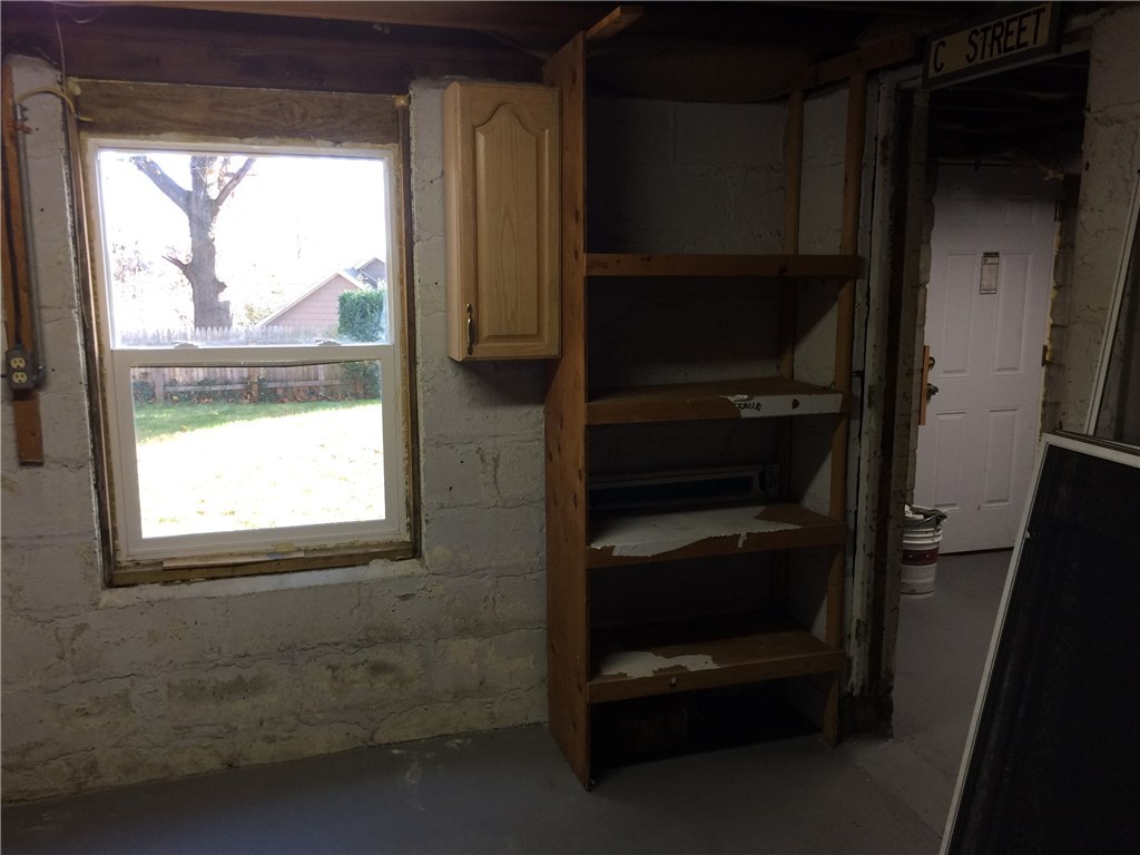 102 Davidson Road Warwick, RI 02886 - Photo 36 of 37 Unfinished basement window and door.