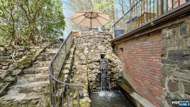 a view of swimming pool with outdoor seating