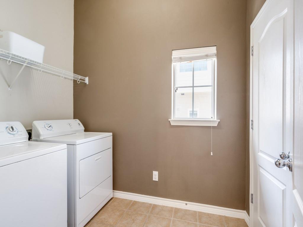 15741 Seabolt Place, Unit 28 Addison, TX 75001 - Photo 22 of 37 Laundry area featuring separate washer and dryer and light tile patterned flooring