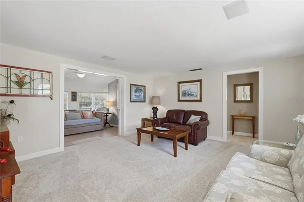 a bedroom with furniture and a couch