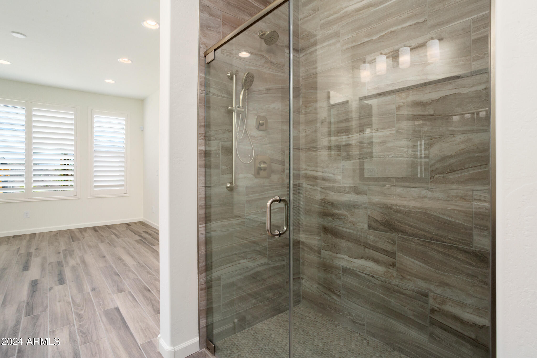 4092 Prairie Schooner Road Wickenburg, AZ 85390 - Photo 23 of 30 a bathroom with a shower