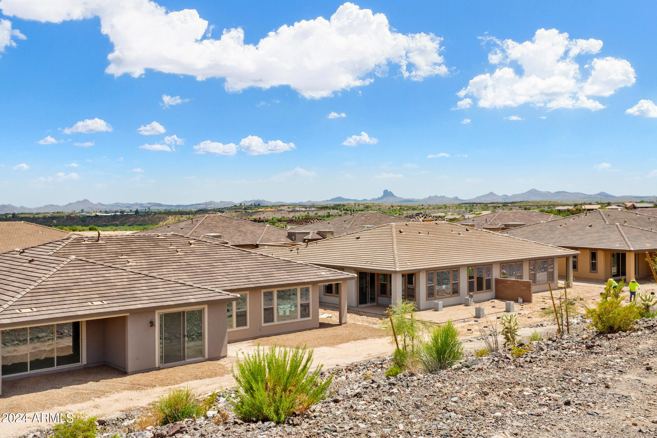 4092 Prairie Schooner Road Wickenburg, AZ 85390 - Photo 30 of 30 a front view of a house with a garden and lake view
