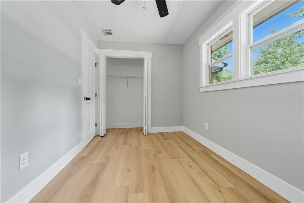 2087 Chestnut Way Lithia Springs, GA 30122 - Photo 13 of 28 a view of an empty room with a window