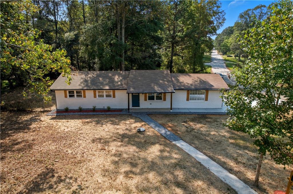 2087 Chestnut Way Lithia Springs, GA 30122 - Photo 2 of 28 a view of a house with a yard