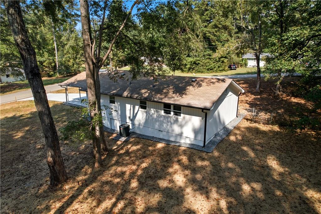 2087 Chestnut Way Lithia Springs, GA 30122 - Photo 24 of 28 a view of a house with a yard