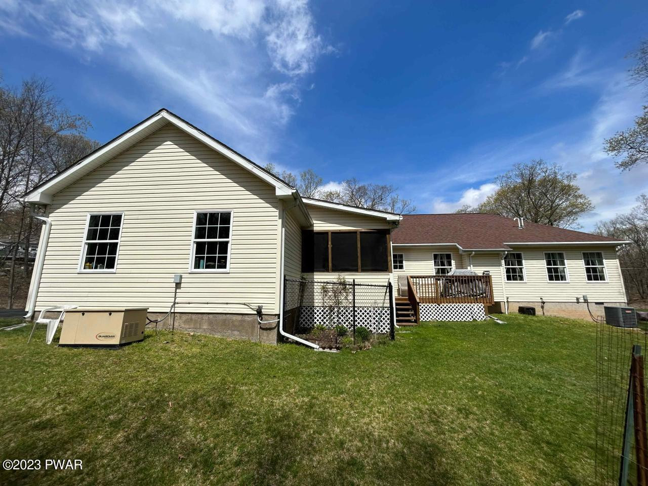 131 Maple Ridge Road Milford, PA 18337 - Photo 9 of 54 a view of a house with a yard