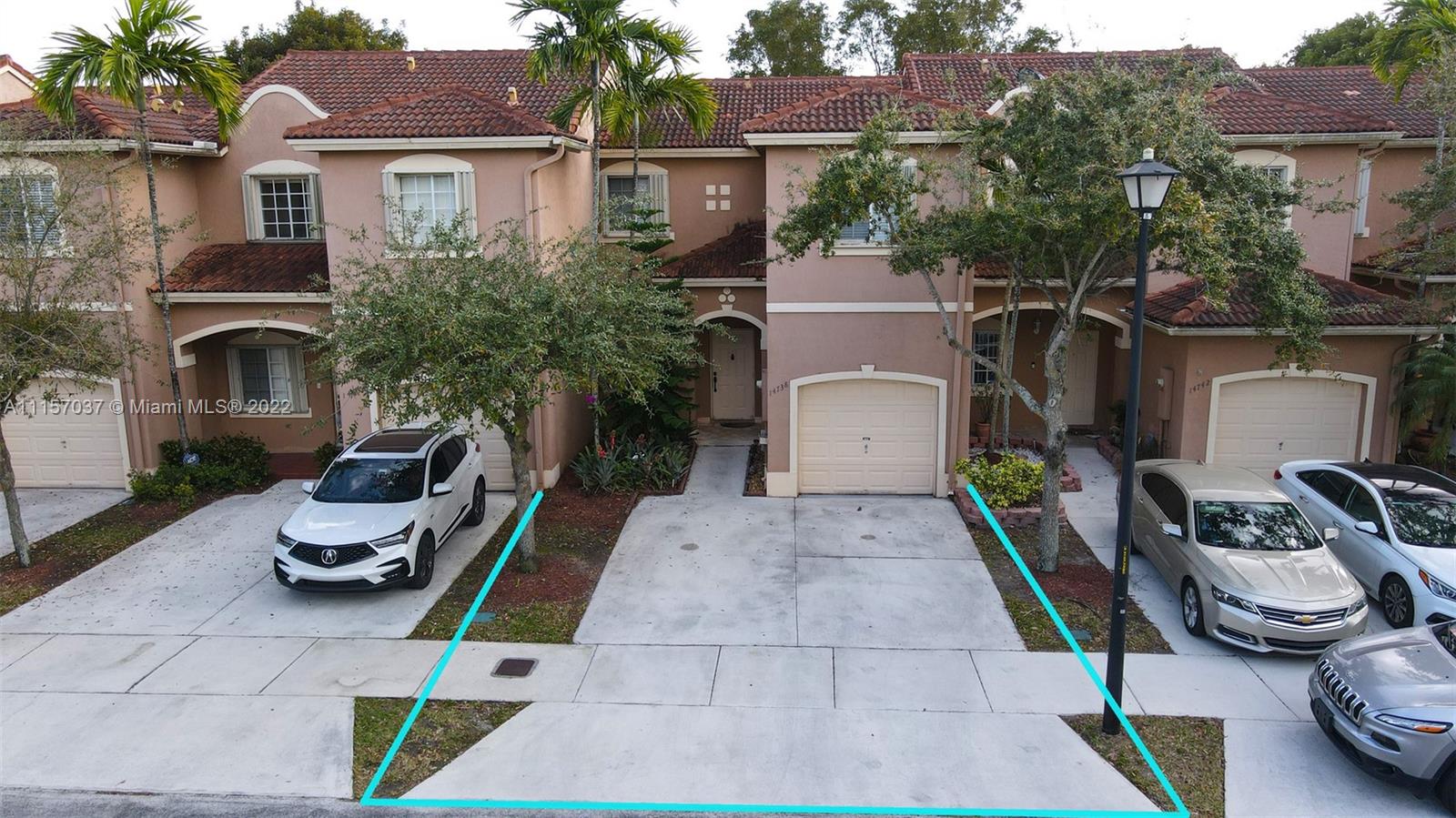 14738 Southwest 9th Lane Miami, FL 33194 - Photo 24 of 30 a front view of house with outdoor seating