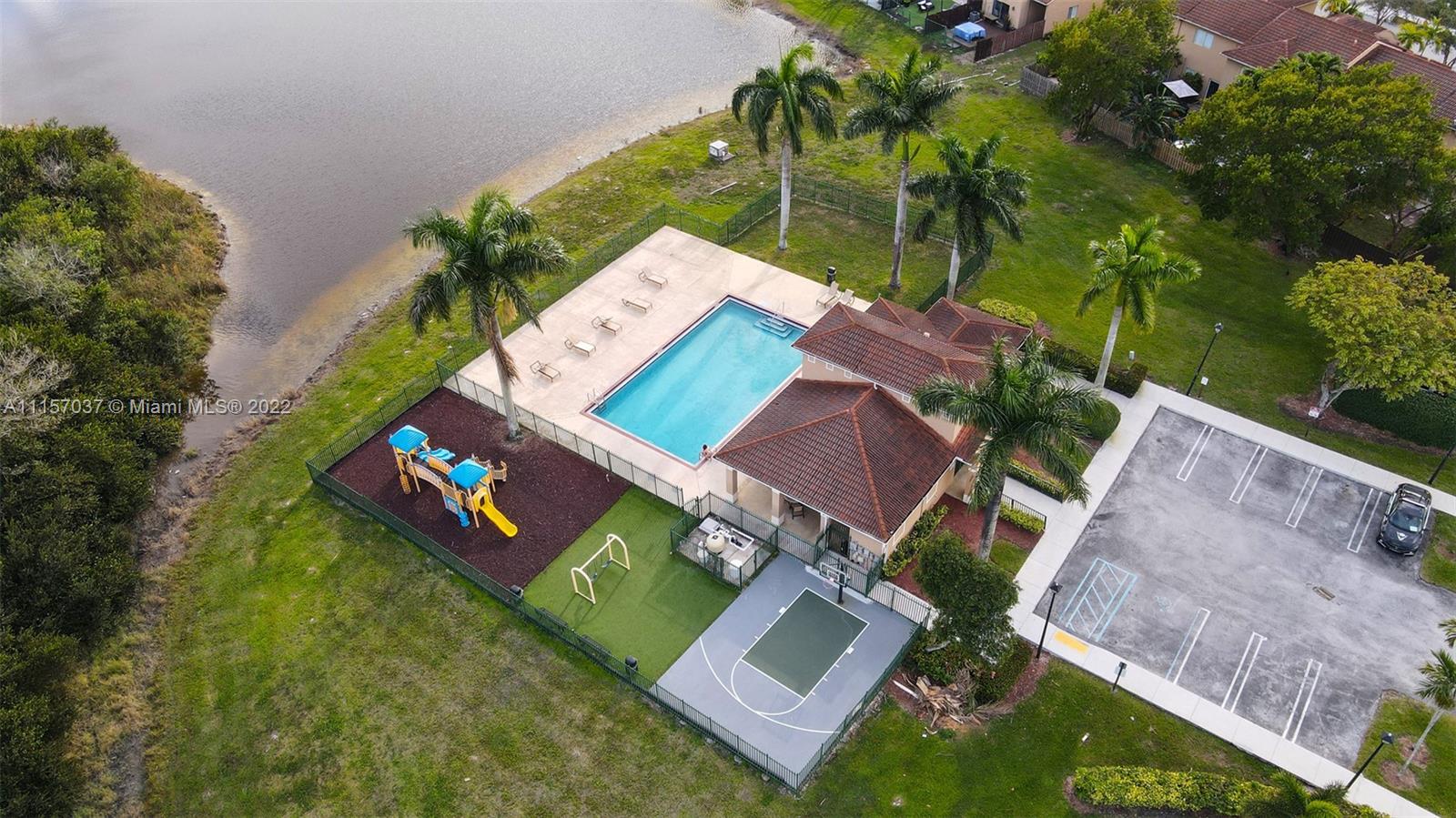 14738 Southwest 9th Lane Miami, FL 33194 - Photo 29 of 30 an aerial view of a house with garden space and street view