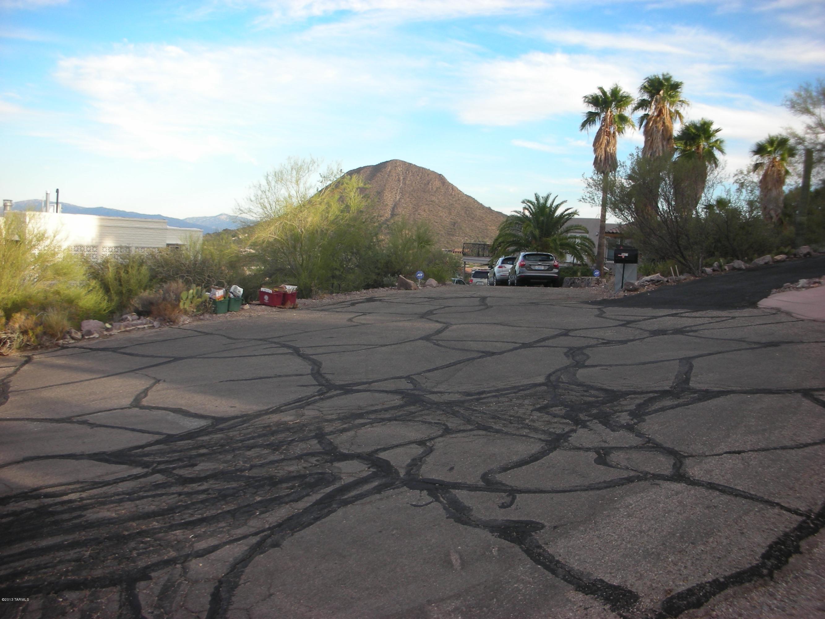 5025 North Vía Roma Tucson, AZ 85745 - Photo 6 of 10 a view of a road with an ocean view