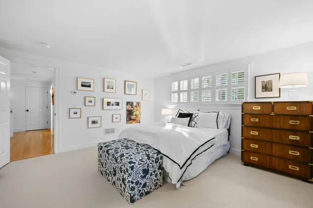 a workspace with furniture and a window