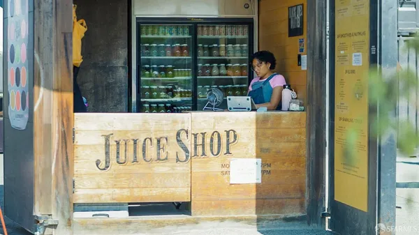 a view of shops on a street