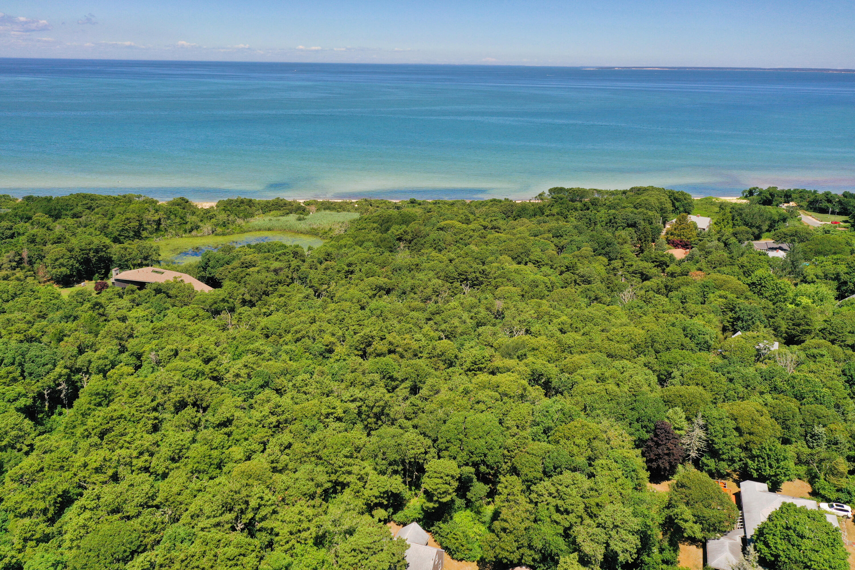 0 Partridge Circle Brewster, MA 02631 - Photo 17 of 19 a view of a field with an ocean