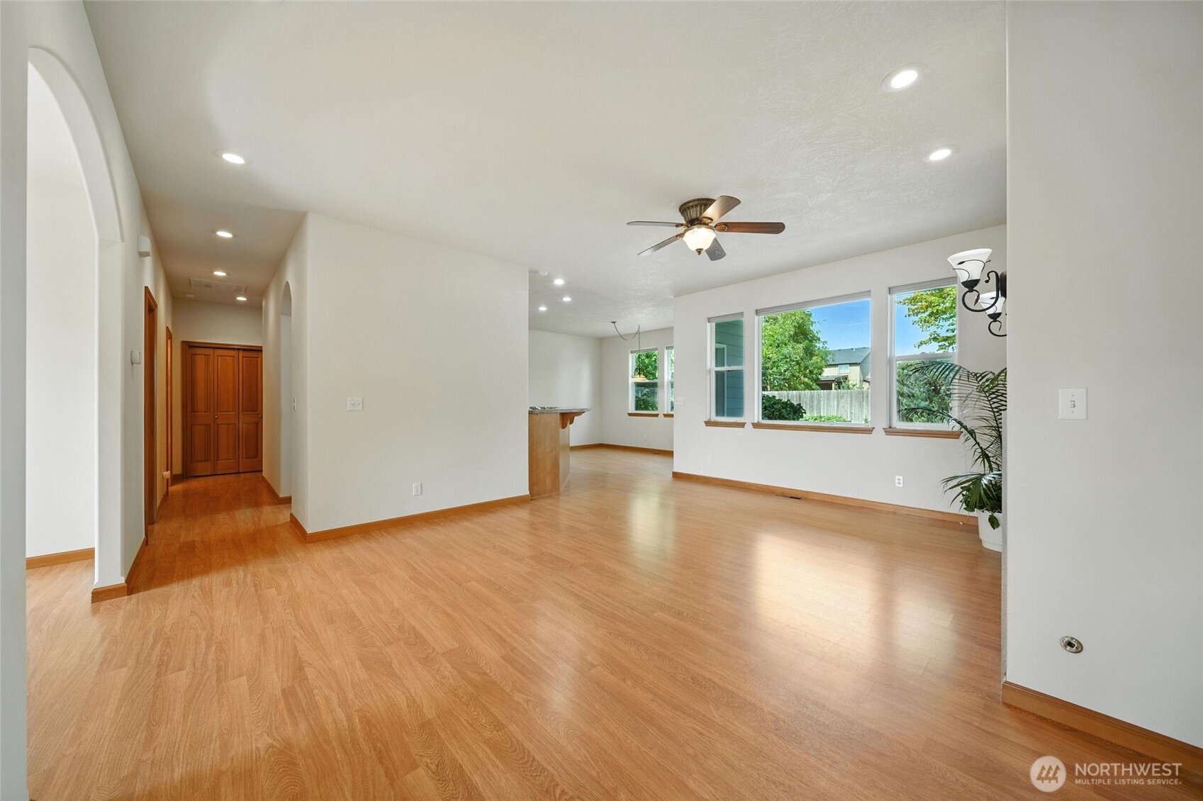 1931 Gemstone Drive Walla Walla, WA 99362 - Photo 18 of 40 a view of an empty room with a window and wooden floor