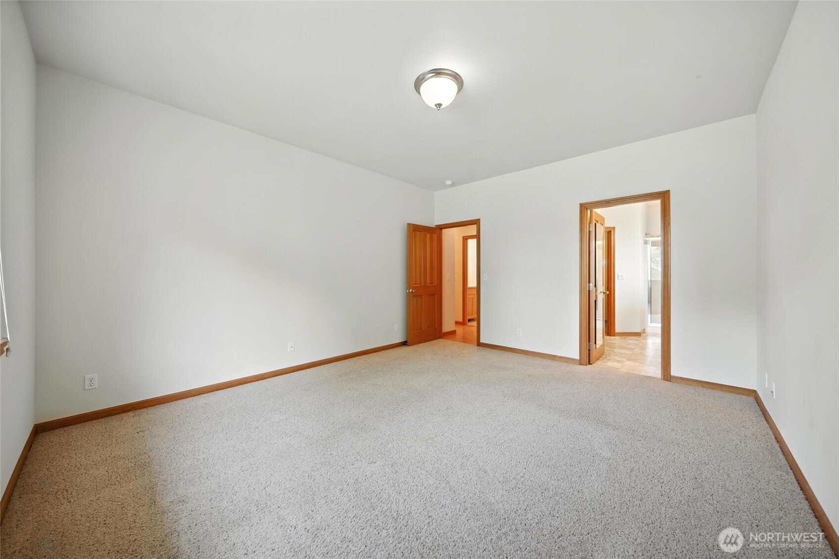 1931 Gemstone Drive Walla Walla, WA 99362 - Photo 24 of 40 a view of an empty room with closet and a window