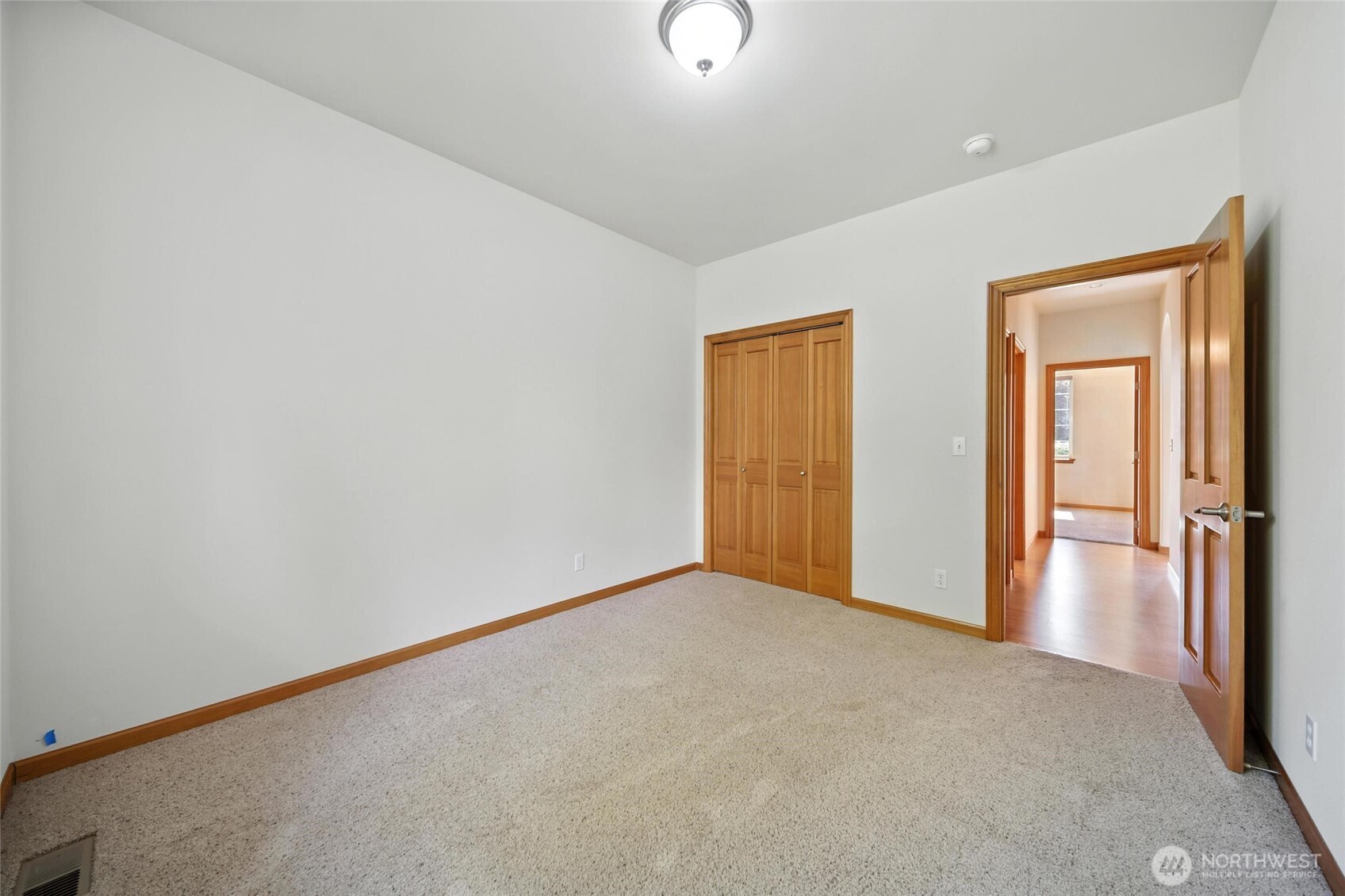 1931 Gemstone Drive Walla Walla, WA 99362 - Photo 28 of 40 a view of an empty room and wooden floor