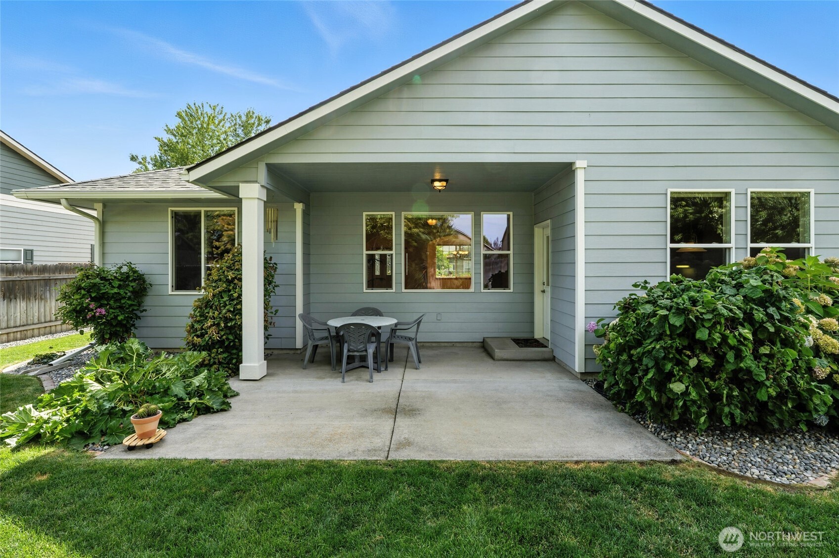 1931 Gemstone Drive Walla Walla, WA 99362 - Photo 32 of 40 a view of an house with backyard space and garden