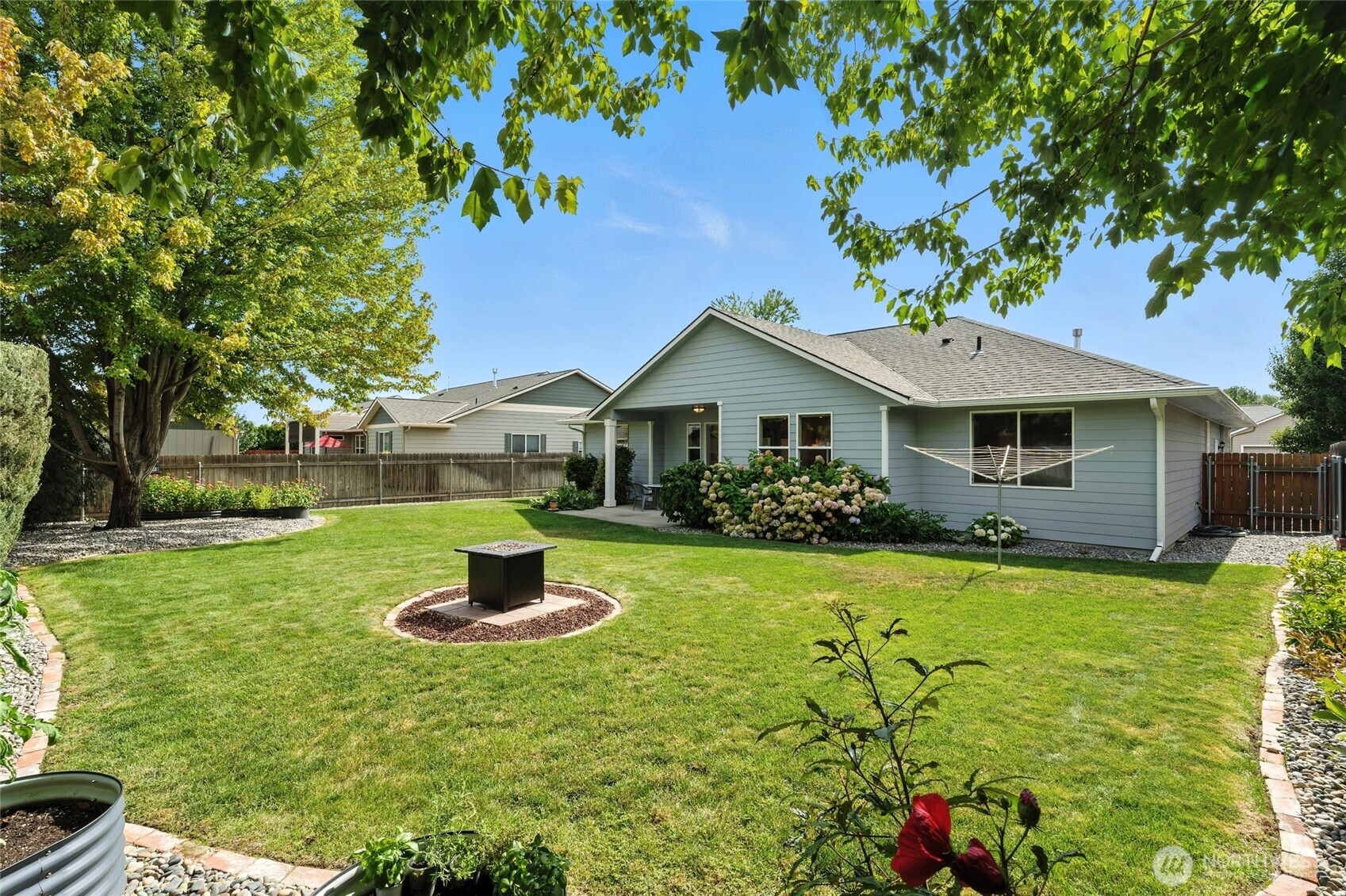 1931 Gemstone Drive Walla Walla, WA 99362 - Photo 34 of 40 a front view of a house with a yard