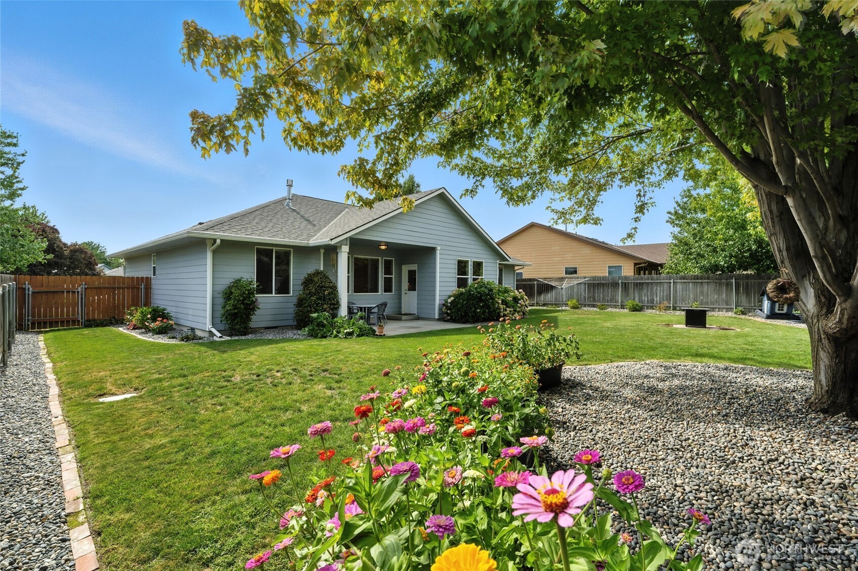 1931 Gemstone Drive Walla Walla, WA 99362 - Photo 37 of 40 a front view of a house with garden