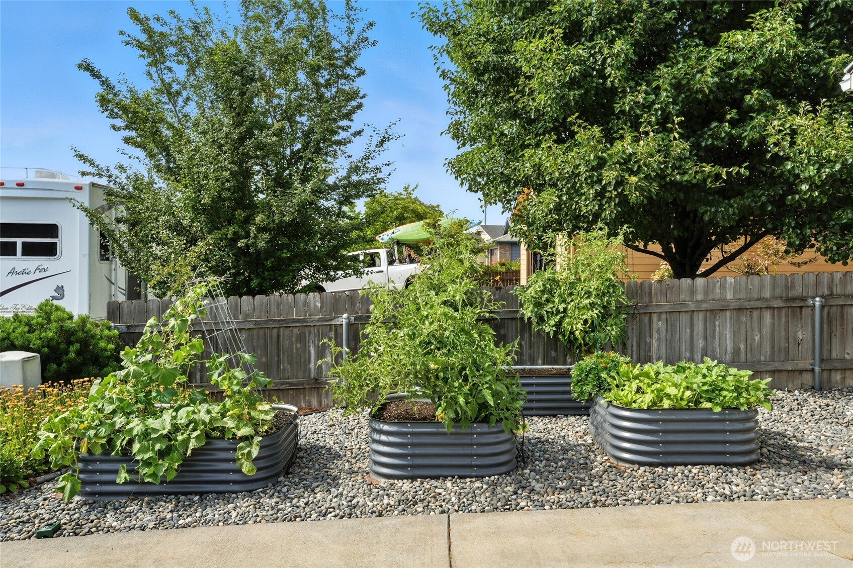 1931 Gemstone Drive Walla Walla, WA 99362 - Photo 4 of 40 a view of a chair and table in a garden