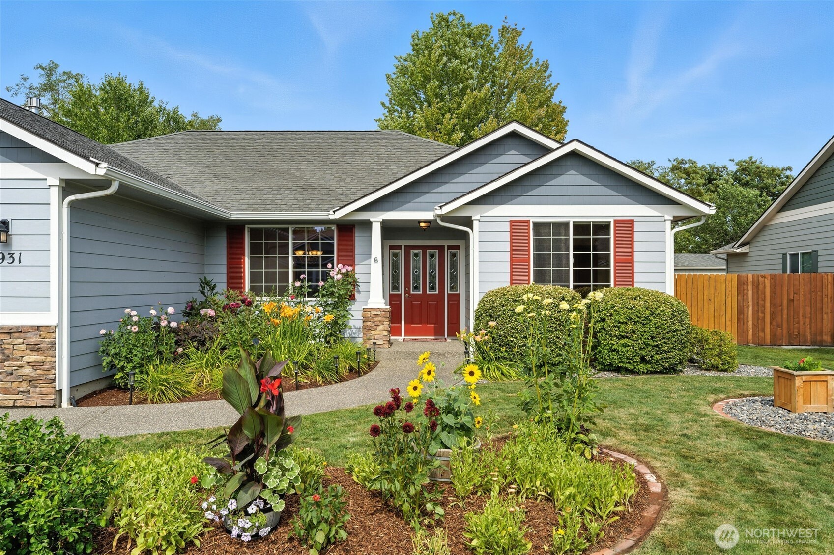 1931 Gemstone Drive Walla Walla, WA 99362 - Photo 5 of 40 a front view of a house with a yard