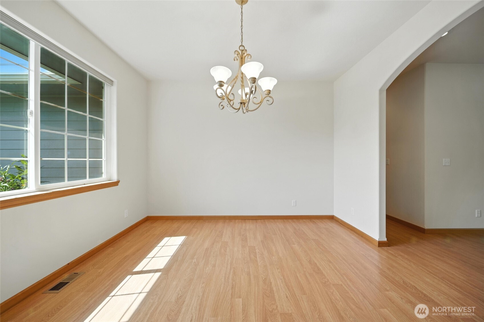 1931 Gemstone Drive Walla Walla, WA 99362 - Photo 8 of 40 a view of empty room with wooden floor and fan