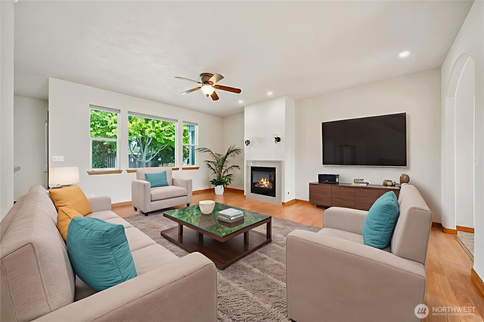 1931 Gemstone Drive Walla Walla, WA 99362 - Photo 10 of 40 a living room with furniture and a flat screen tv