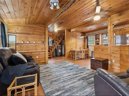 a room with wooden furniture and furniture