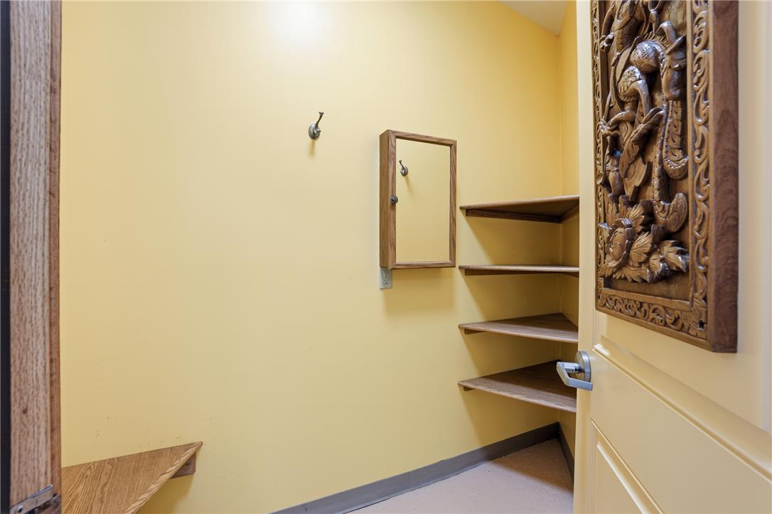 6271 Batman Road Zionsville, PA 18092 - Photo 41 of 100 Functional closet space with open corner shelving and wall hooks for ample storage.