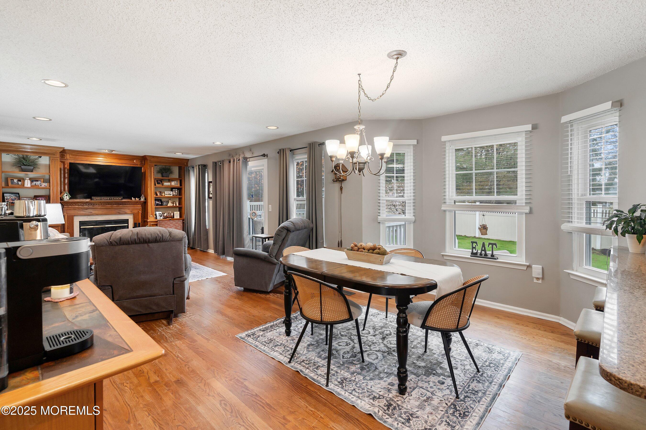 47 Crater Lake Road Howell, NJ 07731 - Photo 11 of 40 a view of a livingroom with furniture window and wooden floor