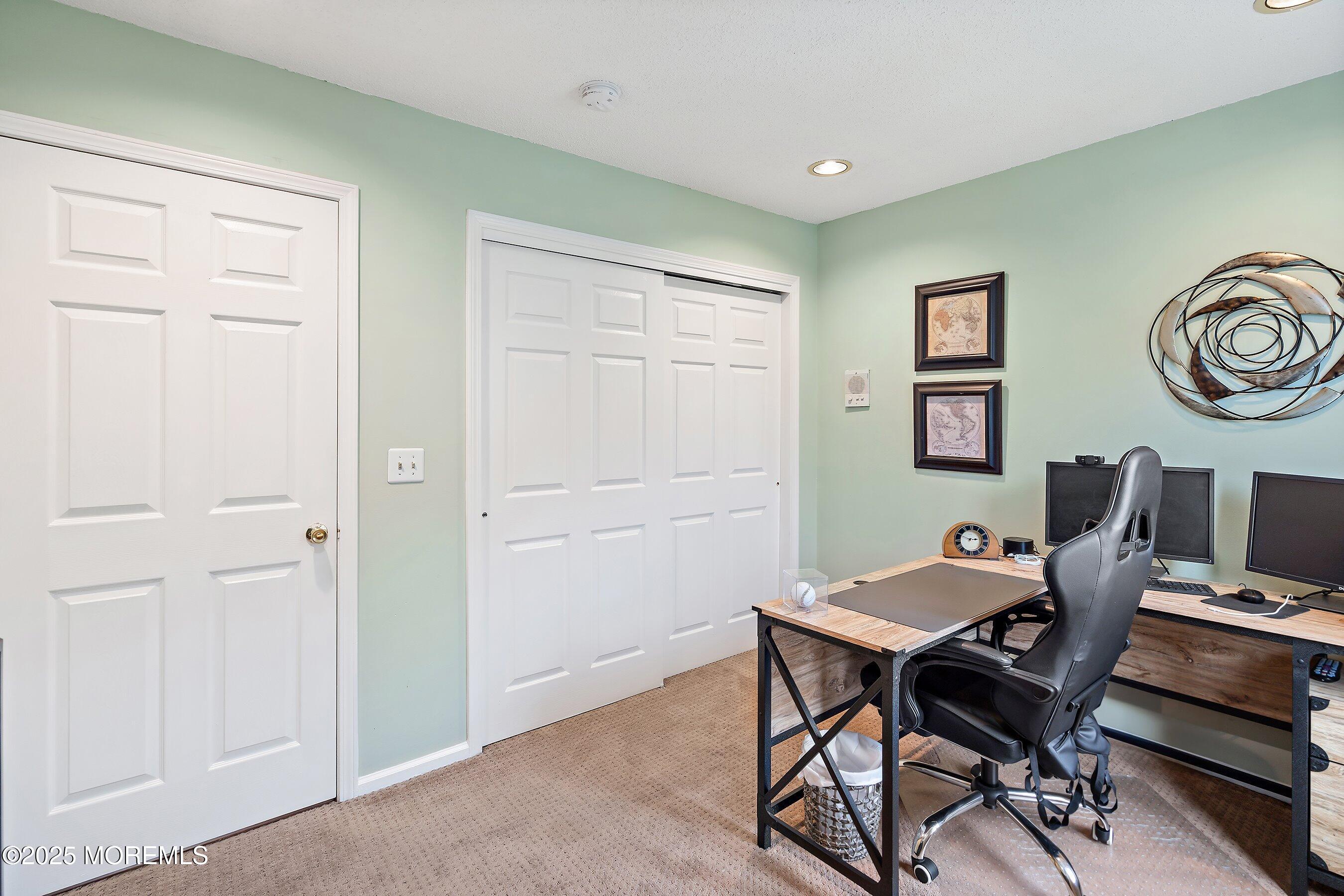 47 Crater Lake Road Howell, NJ 07731 - Photo 20 of 40 a view of a workspace with furniture and wooden floor