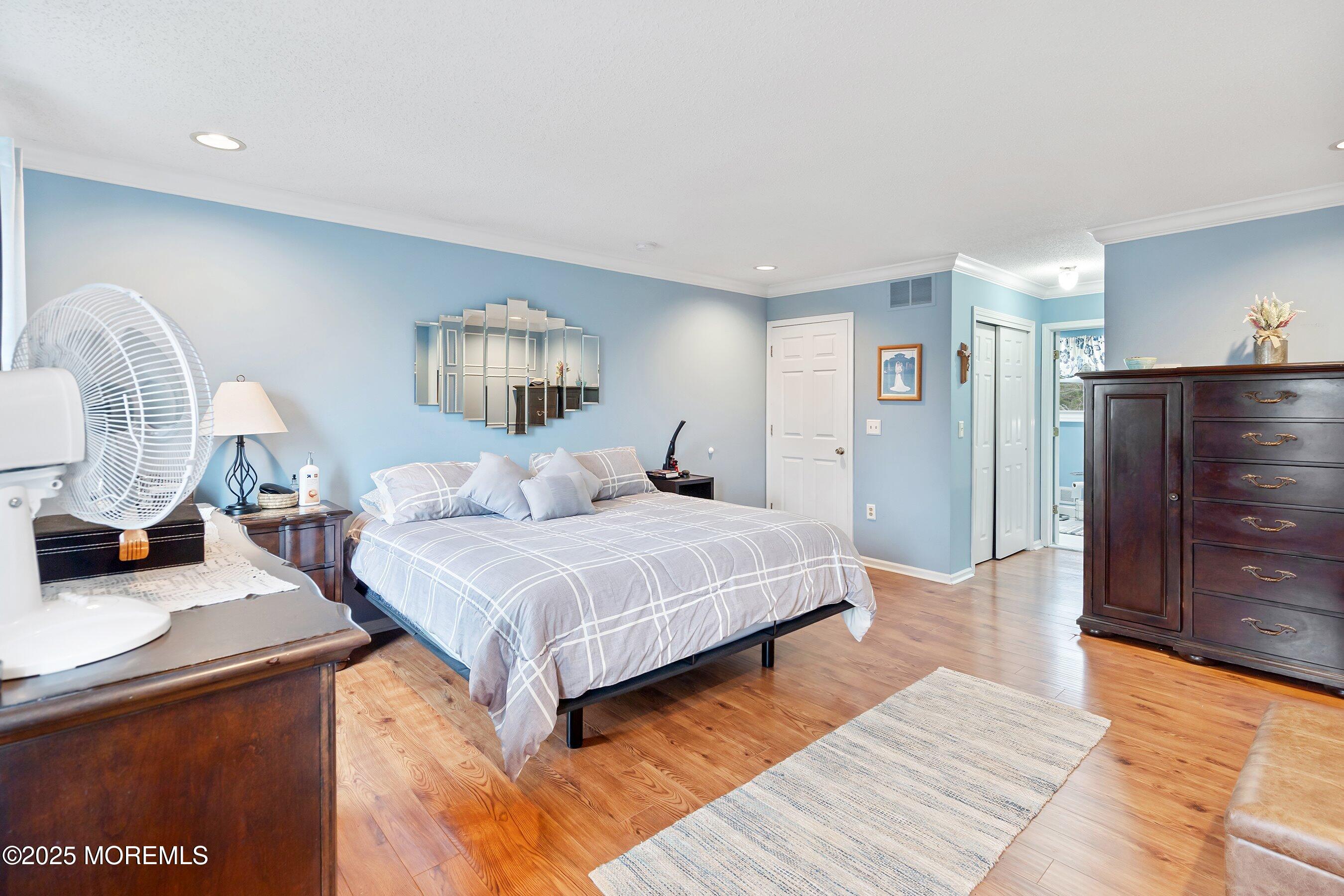 47 Crater Lake Road Howell, NJ 07731 - Photo 23 of 40 a bedroom with a bed and a dresser