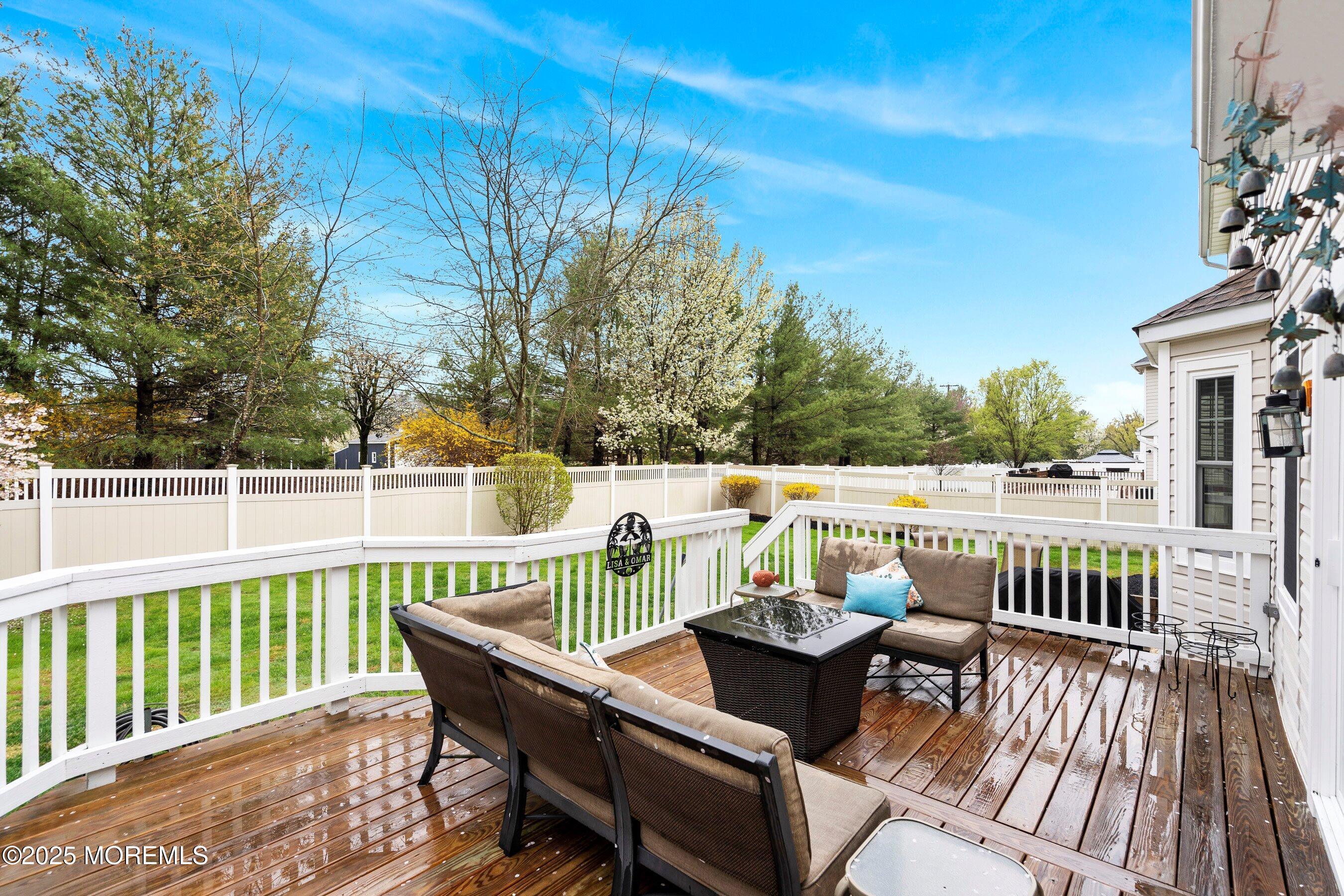 47 Crater Lake Road Howell, NJ 07731 - Photo 33 of 40 a view of balcony with wooden floor and outdoor seating